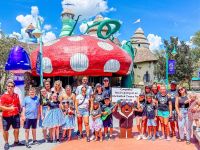 Adventure Ted with children at a CCS Disney trip